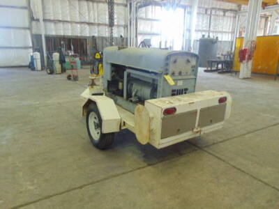 PORTABLE WELDING MACHINE, LINCOLN MDL. SHIELDARC SA250, gasoline pwrd., sgl. axle trailer, bottle racks, lead spools & assorted accessories, S/N 1029687