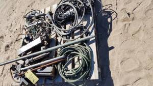 LOT OF ASSORTED TRUCK WHEELS, CHAINS, BINDERS, TORCHES AND WIRE FEEDER PARTS